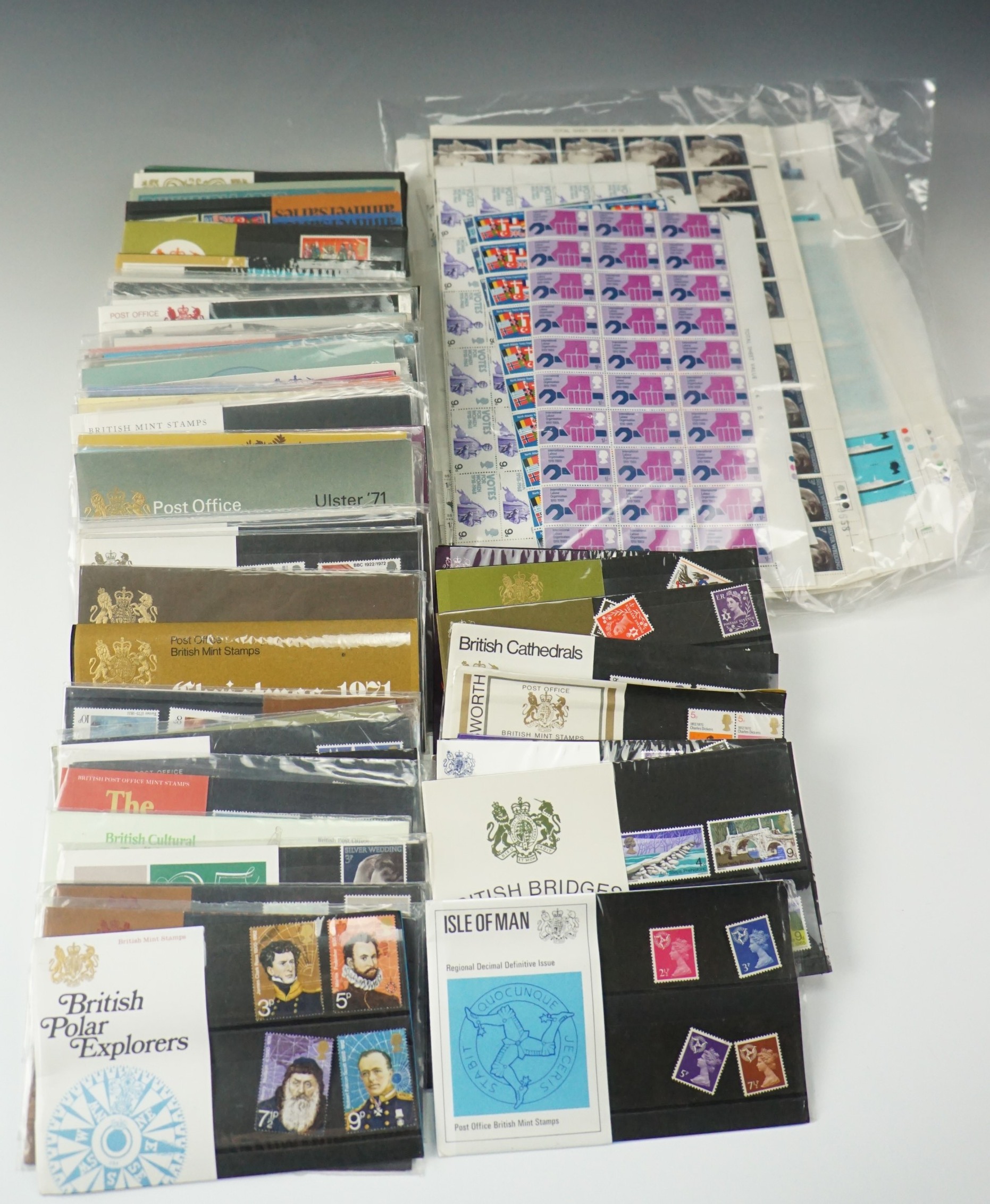 A part sheet of uncirculated decimal 3p stamps and a quantity of British Post Office presentation