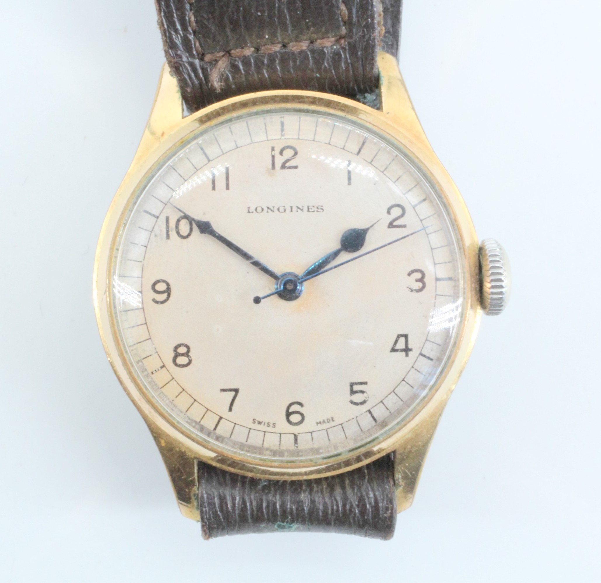 A gentleman's Longines wristwatch, having a mat silvered dial with Arabic numerals and blued steel