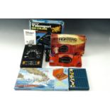 A boxed Prinztronic "Videosport 800" colour TV game, a Battleship game and "Jet Fighters" computer