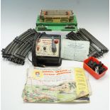 A quantity of Lionel model railway track together with a multi-control Trainmaster transformer (U.S.