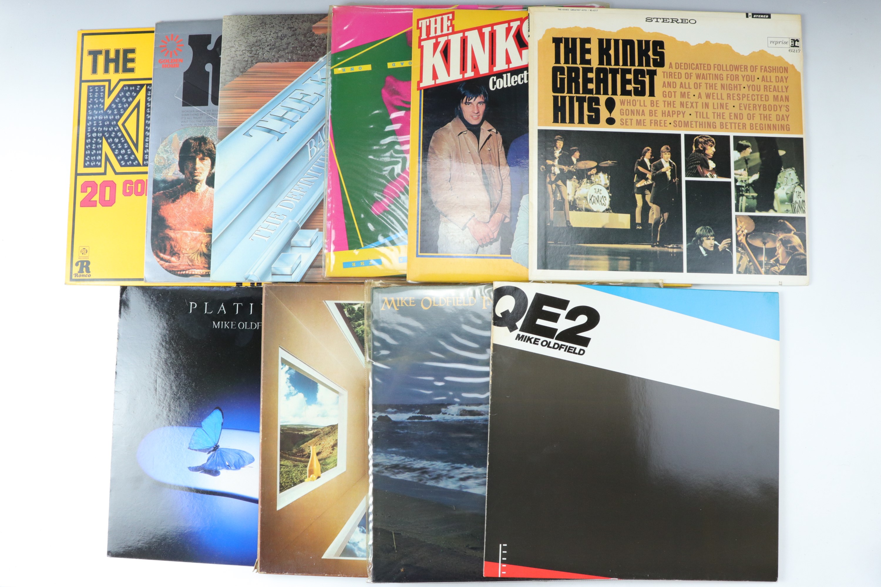 A quantity of various cased LP records including four Mike Oldfield, six The Kinks, five Genesis,