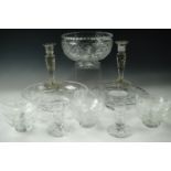 A large crystal fruit bowl, two pairs of candlesticks, six sundae dishes, table centre-piece and