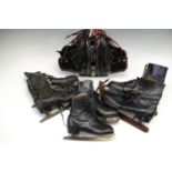 Three pairs of vintage ice skates together with ski boots
