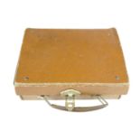 A small vintage fibre case containing military and other ephemera