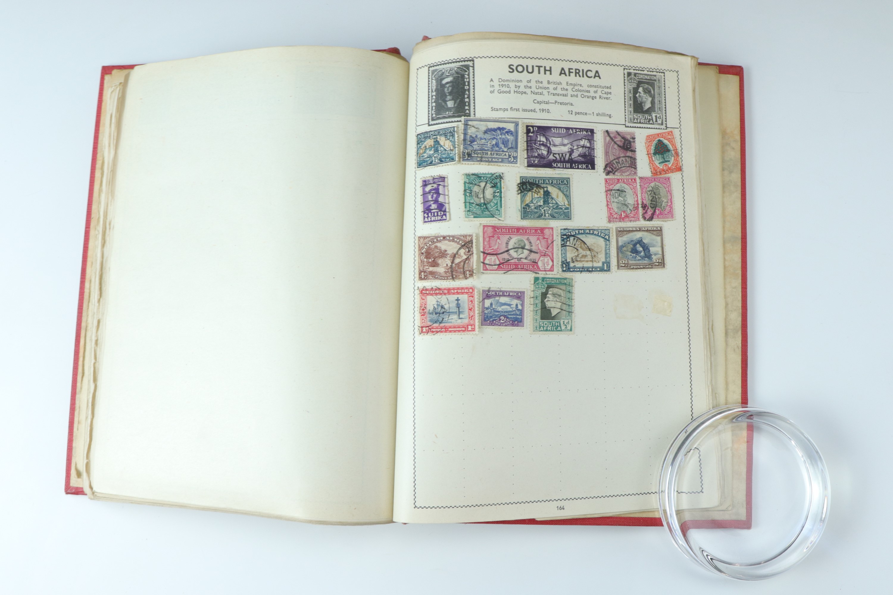 Several juvenile stamp albums containing GB and world stamps, with uncirculated and specimen GB - Image 28 of 47