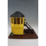 An Aristocraft signal tower for garden model railway