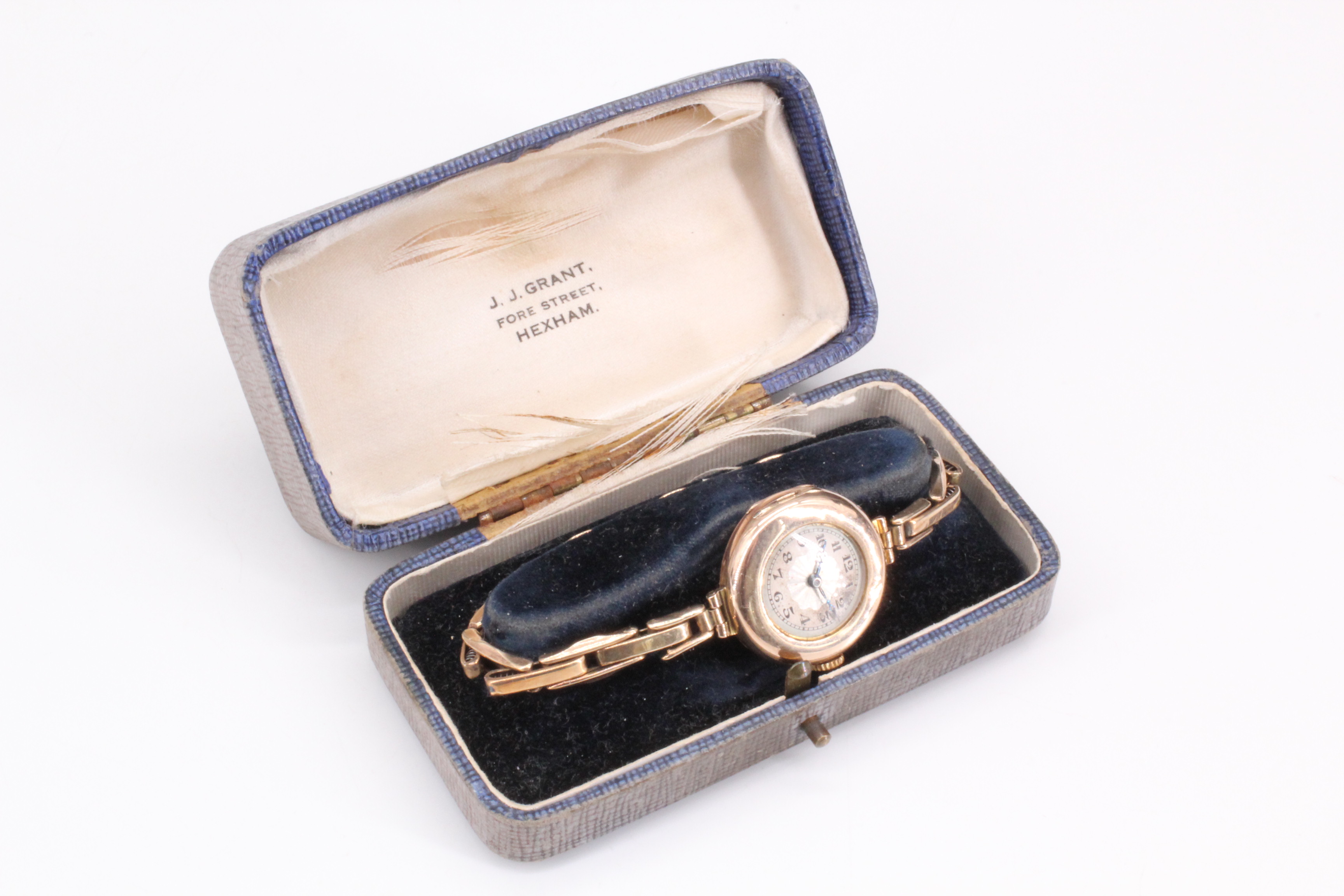 A lady's 9 ct gold wristwatch, on an expanding gold bracelet, the dial being engine turned, with - Image 2 of 2