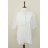 A 1970s Laura Ashley white cotton shirt, label size 16