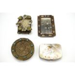 A French powder compact decorated with glass cabochons, together with two vintage photo frames and a