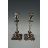 A pair of Victorian electroplate candlesticks, having detachable bobeches, 26 cm