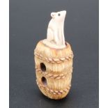 A Japanese stag horn netsuke of a mice on a rice bale, 5 cm