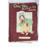 An early 20th Century cloth story book, No.153 "One Two Buckle my Shoe", produced by Dean's Rag Book