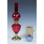 A ruby and gilt oil lamp (a/f), together with a boxed miniature oil lamp, 43 cm and 13 cm