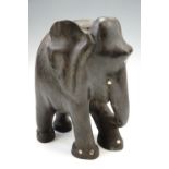 A carved wooden lamp base in the form of an elephant, 31 cm