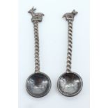 A pair of novelty salt spoons, formed from two Edward VII 1/4 rupee coins, early 20th Century,
