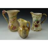 Arthur Wood, Sylvac jug shape 1623 and a Royal Devon jugs, tallest 21 cm