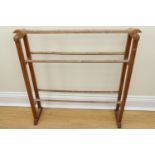A late 19th Century Arts and Crafts influenced oak towel rail, having dowelled tenon joints, 72 cm x