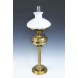 A brass columnar oil lamp, 75 cm