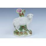 A Staffordshire spill vase modelled as sheep, 19 cm