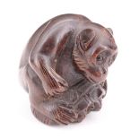 A Japanese carved wood netsuke of a monkey riding a turtle, 3.5 cm