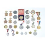 A large collection of Royal commemorative medallions and badges