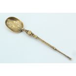 A gilt silver anointing spoon bearing engraved honeysuckle and foliate decoration, Henry Clifford