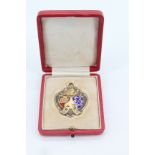 An Edwardian enamelled silver gilt Bisley military marksmanship prize watch chain fob medallion,
