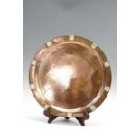 A Arts and Crafts planished copper tray with applied embossed white metal decoration and having a