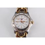A TAG Heuer woman's professional sports watch, model SEL WG1222, having a quartz movement and