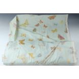 A part bolt of printed cotton fabric decorated with butterflies, "Norcombe Hill" pattern by