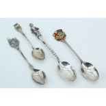 A silver and enamelled Carlisle spoon and other spoons