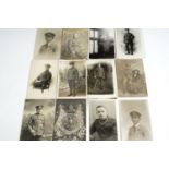 A small group of Great War and Second World War photographic and portrait postcards