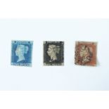 A Penny Black stamp together with a Penny Blue stamp and Penny Reds