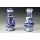A pair of Spode blue and white salt and pepper pots, 17 cm