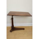 A William IV style mahogany bed table, early 20th Century
