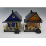 Two garden model railway cottages