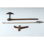 An antique Zulu / Southern African axe together with a Malayan Kris and a bushman arrow