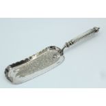 An Victorian electroplate silver crumb scoop, the blade having engraved repouse scrolling