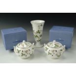 Two boxed Wedgwood "Wild Strawberry" sugar boxes retailed by Harrods, together with a "Wild