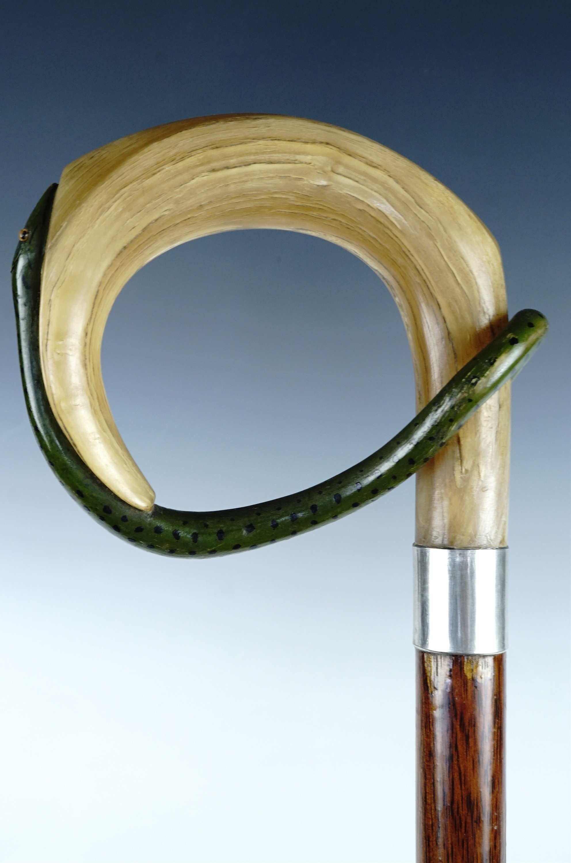 Two horn handled walking sticks, comprising a stick with a carved ram's horn handle on a reticulated - Image 2 of 4