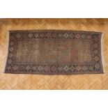 A Persian (Azerbaijani) rug, 250 x 115 cm