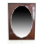 A carved mahogany mirror, 67 x 92 cm