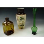 A Victorian hand painted glass vase together with a green glass vase and bottle, first 26 cm