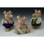 Three Wade piggy banks with TSB stoppers, tallest 16 cm