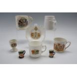 A peace mug, commemorative ware and two miniature Royal Doulton character jugs