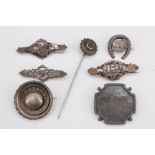 Six Edwardian silver brooches (a/f), and a silver stick pin, 26 g gross
