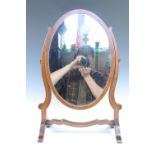 A classical style oval gilt framed mirror, 39 x 55 cm