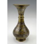 A late 19th / early 20th Century Damascened / Cairo ware vase, 23 cm