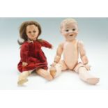 A late 19th / early 20th Century Franz Schmidt & Co bisque headed doll having open mouth and
