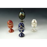 Three ceramic jeweled eggs and one other
